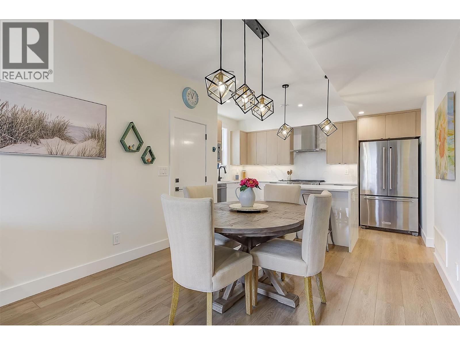 Dining area positioned just off the kitchen - 747 Patterson Avenue Unit# 2, Kelowna, BC - Indoor Photo Showing Dining Room