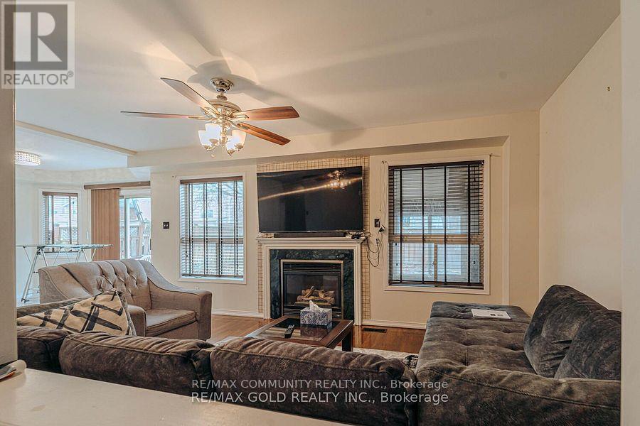 10 Squirreltail Way, Brampton, ON - Indoor Photo Showing Living Room With Fireplace