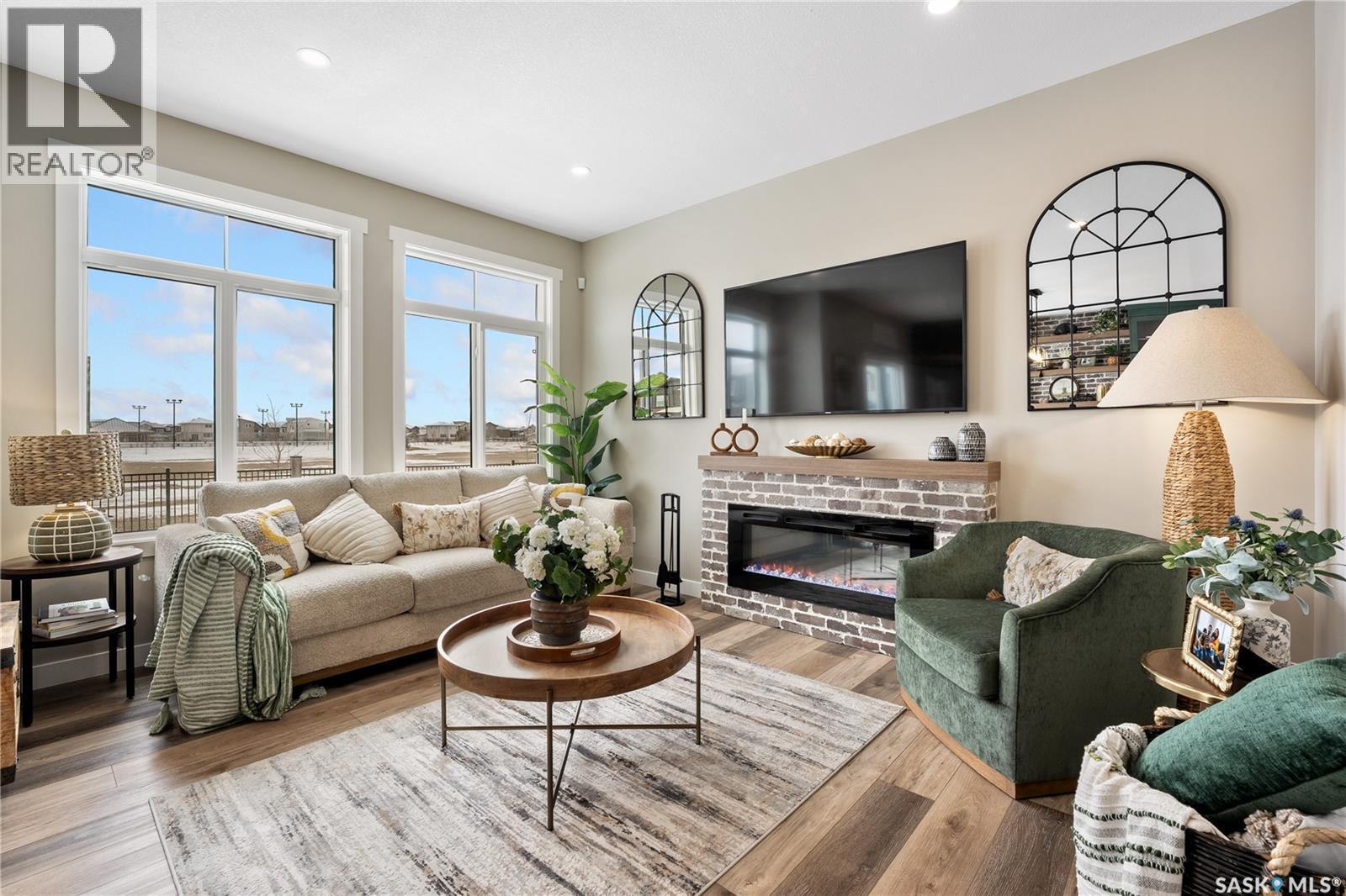 2970 Dumont Way, Regina, SK - Indoor Photo Showing Living Room With Fireplace