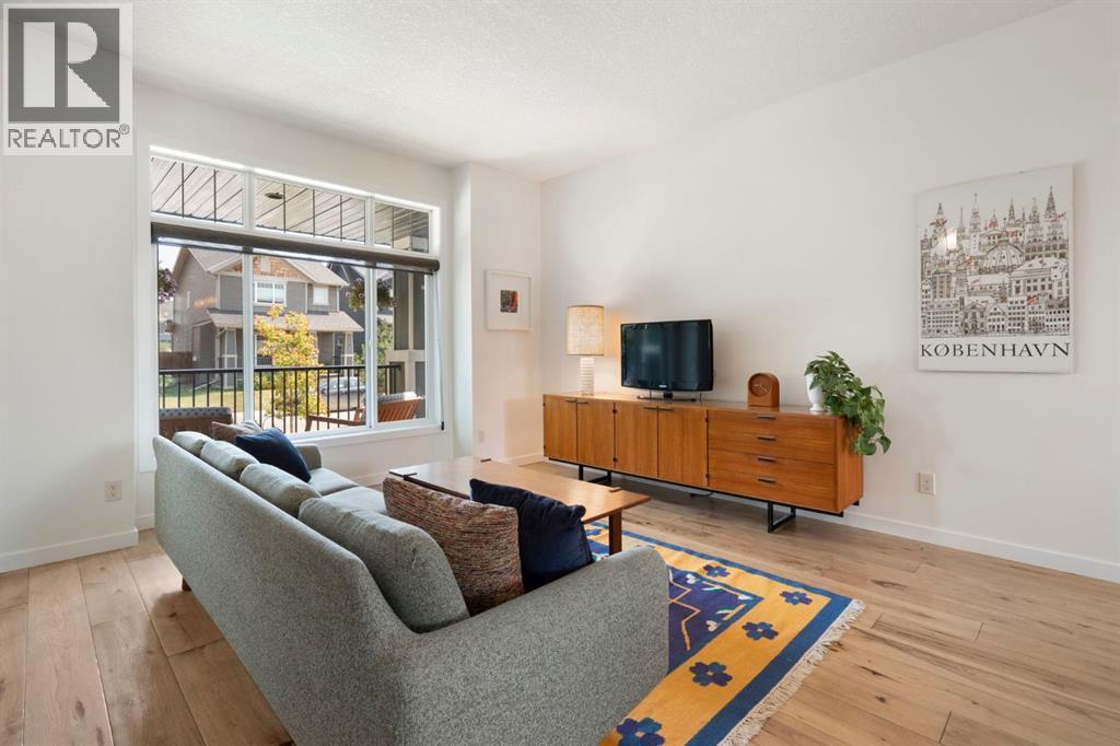 12 Fireside Burrow, Cochrane, AB - Indoor Photo Showing Living Room