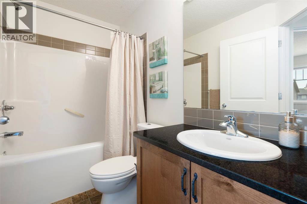 12 Fireside Burrow, Cochrane, AB - Indoor Photo Showing Bathroom
