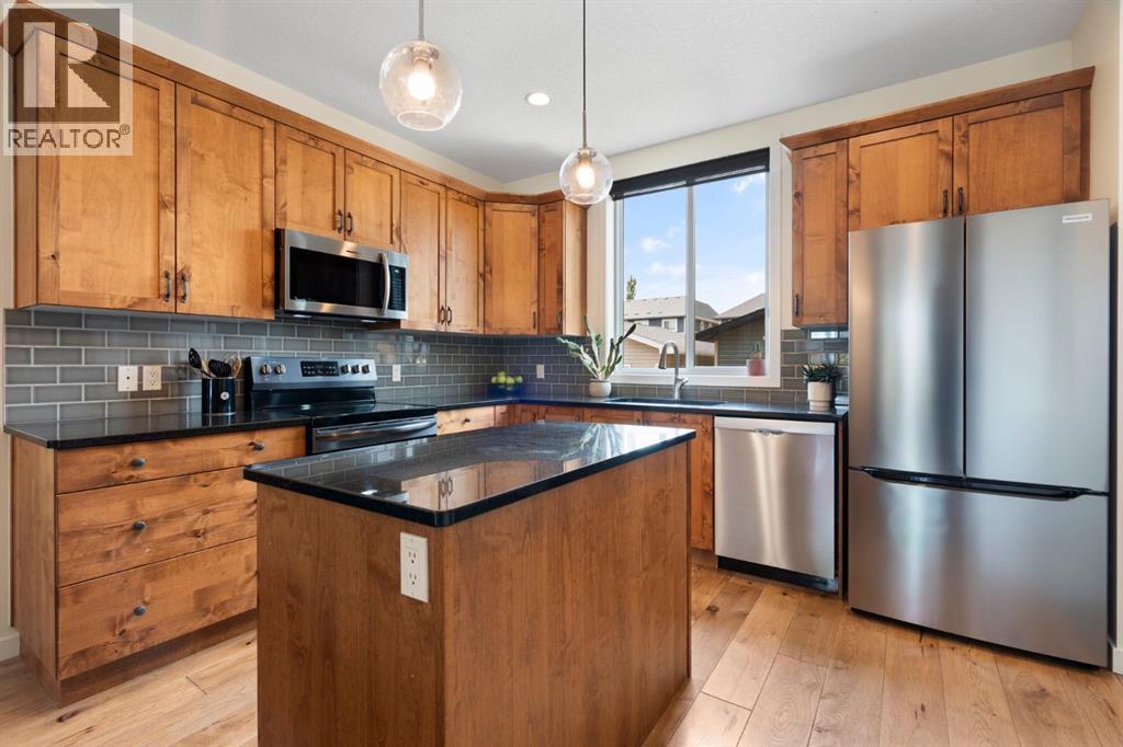 12 Fireside Burrow, Cochrane, AB - Indoor Photo Showing Kitchen