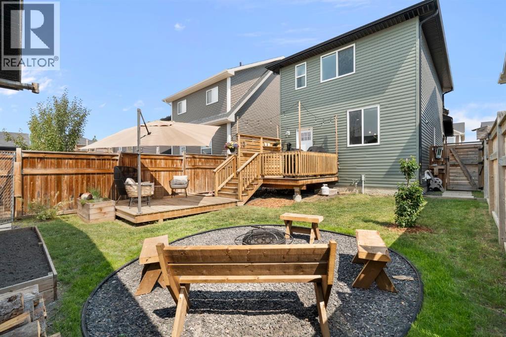 12 Fireside Burrow, Cochrane, AB - Outdoor With Deck Patio Veranda