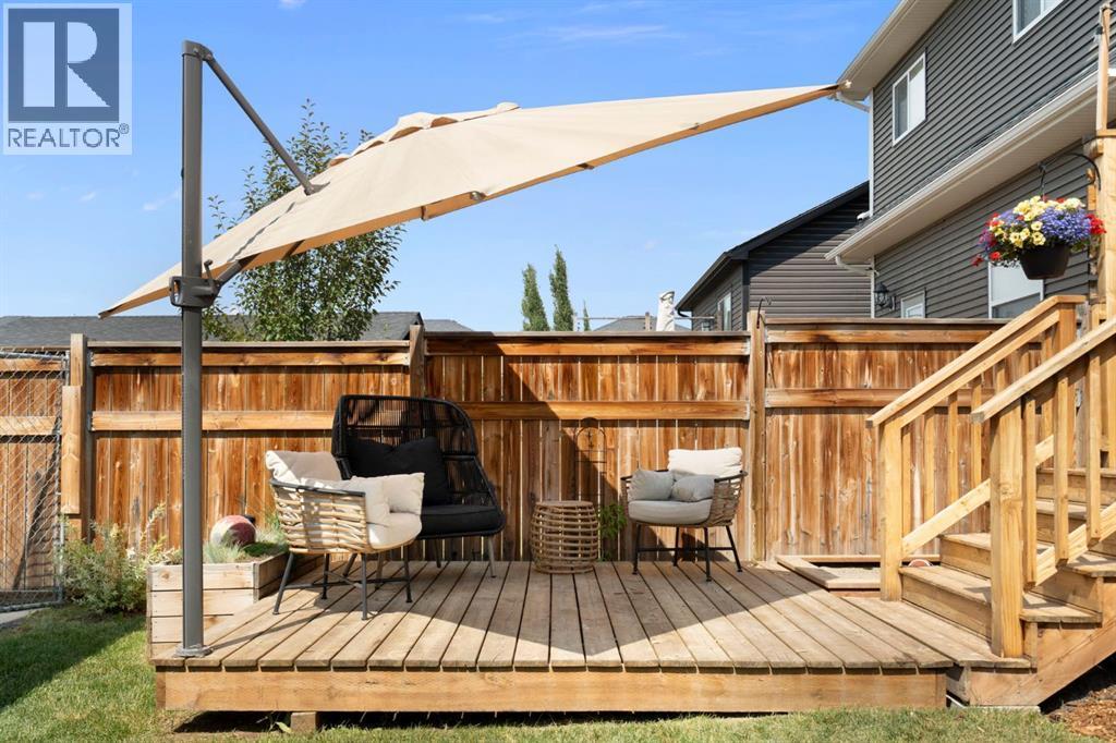 12 Fireside Burrow, Cochrane, AB - Outdoor With Deck Patio Veranda With Exterior