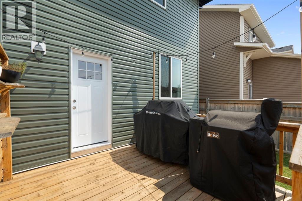 12 Fireside Burrow, Cochrane, AB - Outdoor With Deck Patio Veranda With Exterior