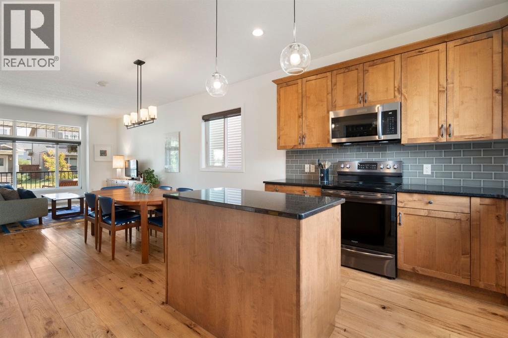 12 Fireside Burrow, Cochrane, AB - Indoor Photo Showing Kitchen