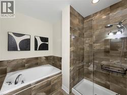 Built-in soaking tub with chrome fixtures - 