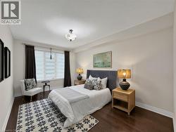 Hardwood flooring, coved ceilings, central window, and semi-flush mount lighting - 