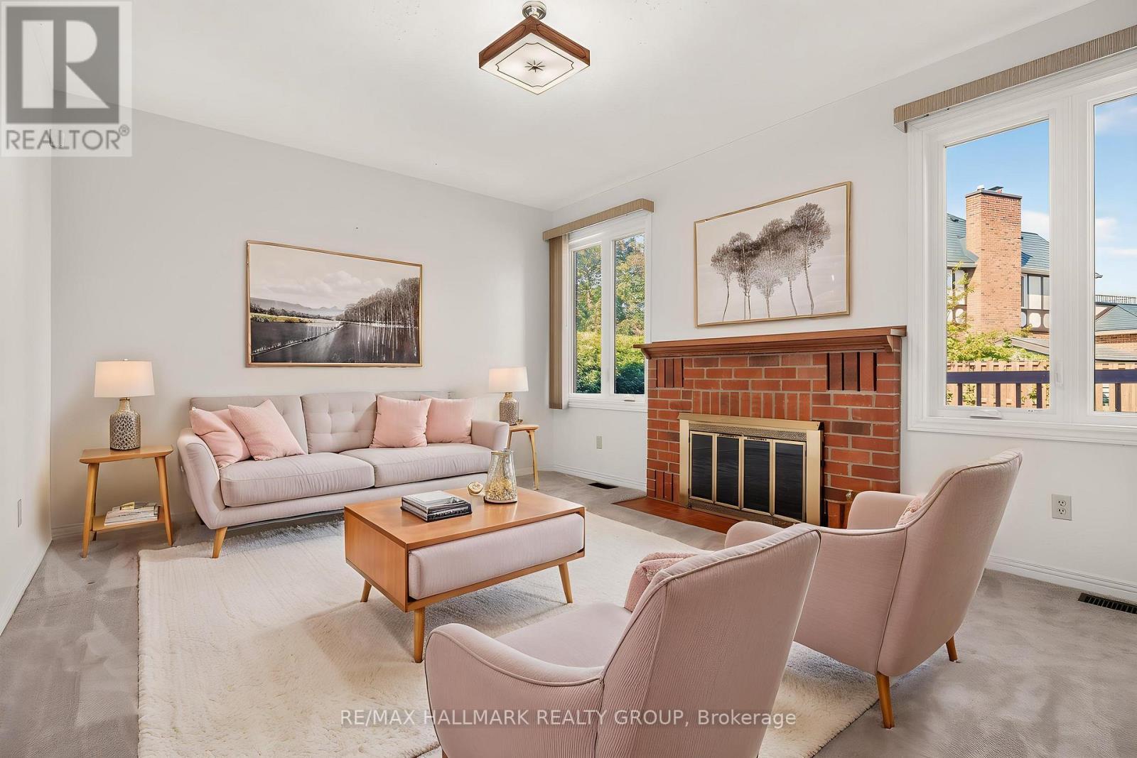 Photo is Virtually Staged - 38 Bateman Drive, Ottawa, ON - Indoor Photo Showing Living Room With Fireplace