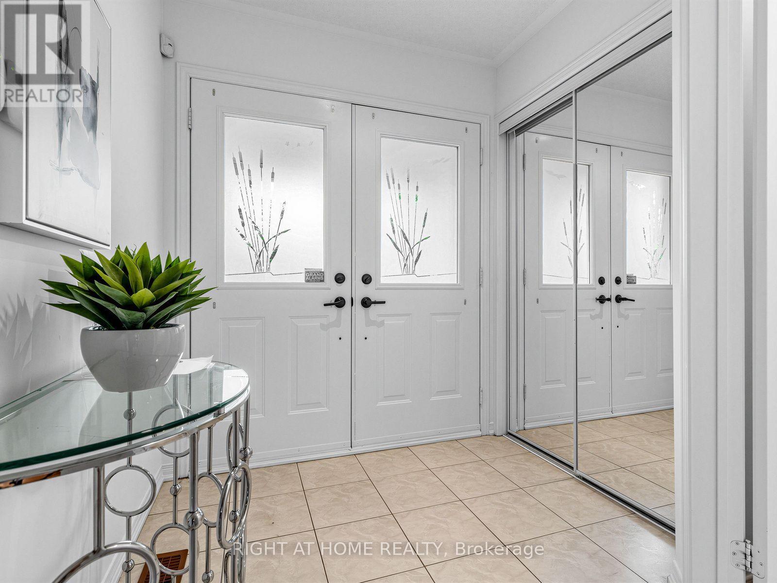Double Door Entry to Foyer & Large coat closet - 81 Briarcrest Drive, Markham, ON - Indoor Photo Showing Other Room