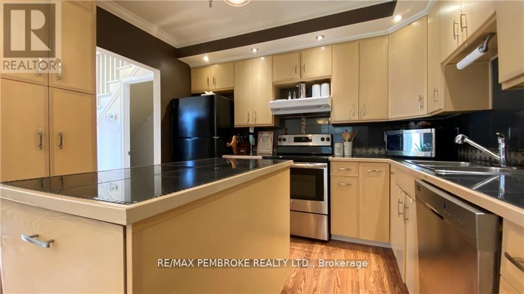 16 Wolfe Avenue, Deep River, ON - Indoor Photo Showing Kitchen With Double Sink