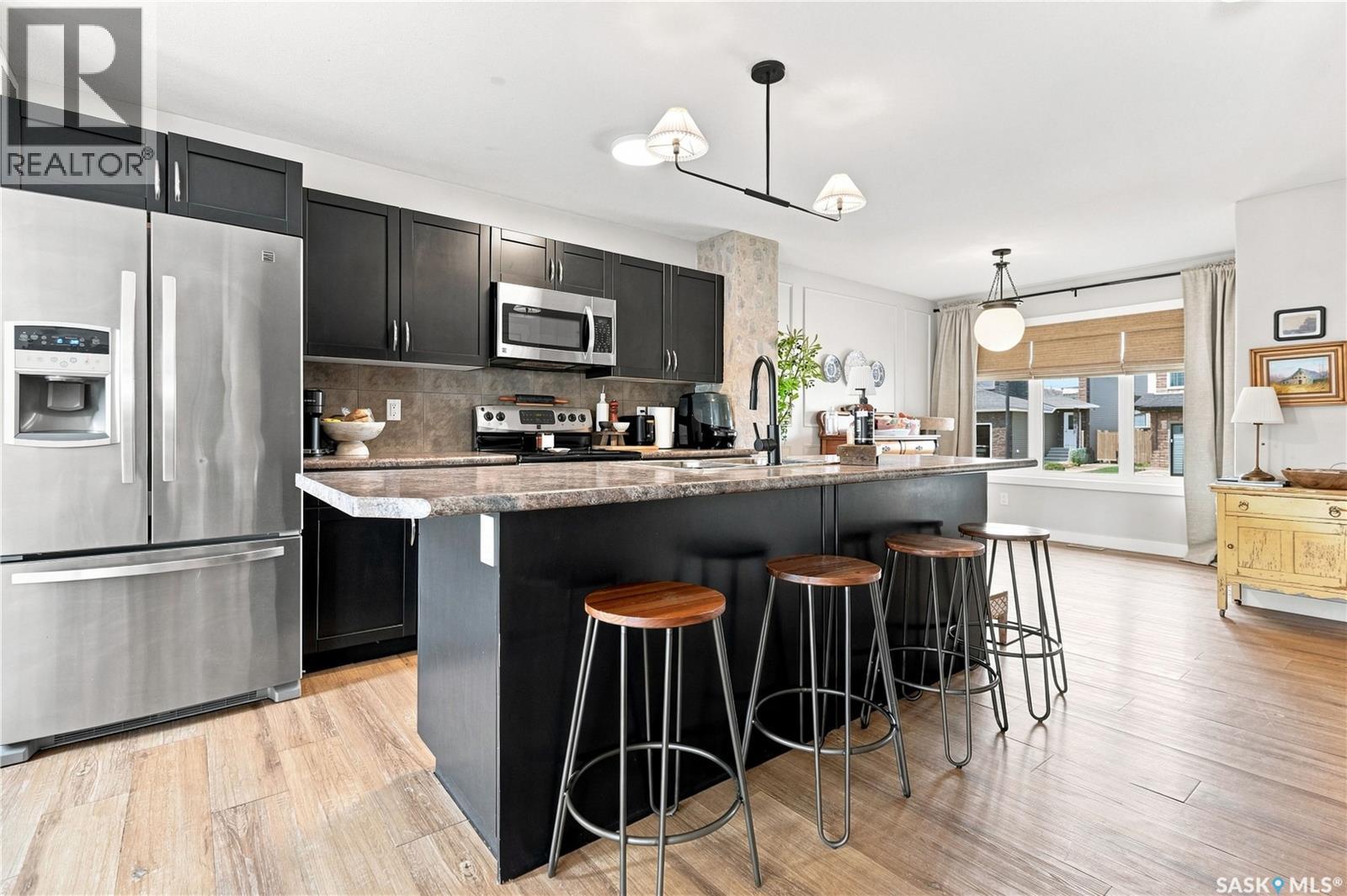 4409 Green Poplar Lane E, Regina, SK - Indoor Photo Showing Kitchen With Stainless Steel Kitchen With Upgraded Kitchen