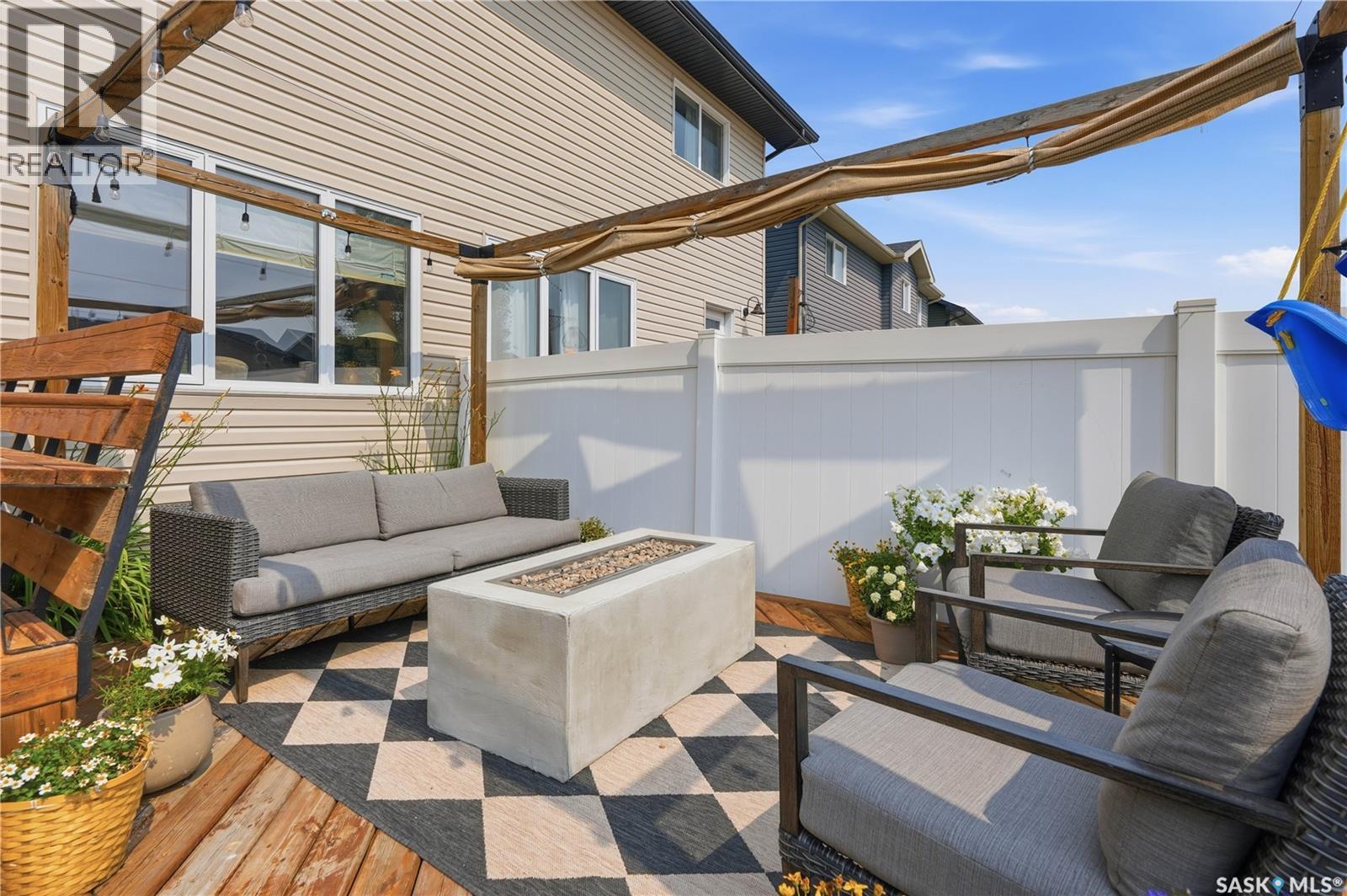 4409 Green Poplar Lane E, Regina, SK - Outdoor With Deck Patio Veranda With Exterior