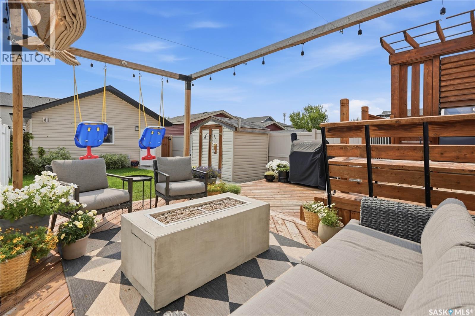 4409 Green Poplar Lane E, Regina, SK - Outdoor With Deck Patio Veranda With Exterior