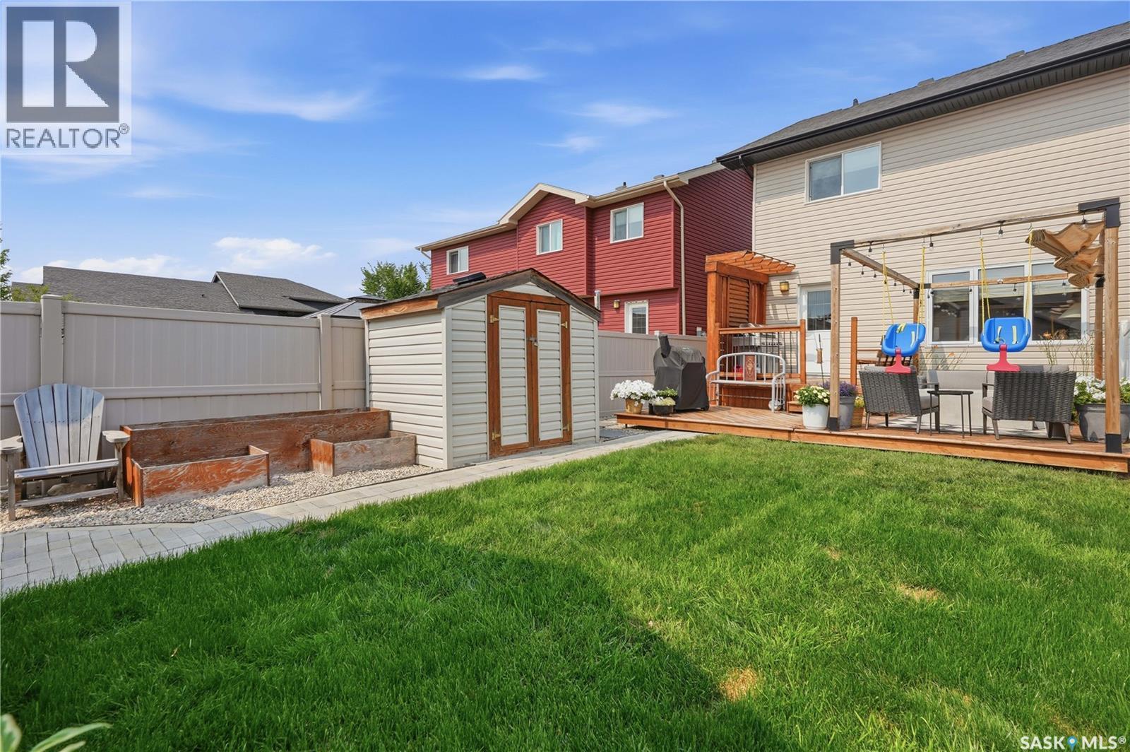 4409 Green Poplar Lane E, Regina, SK - Outdoor With Deck Patio Veranda With Exterior