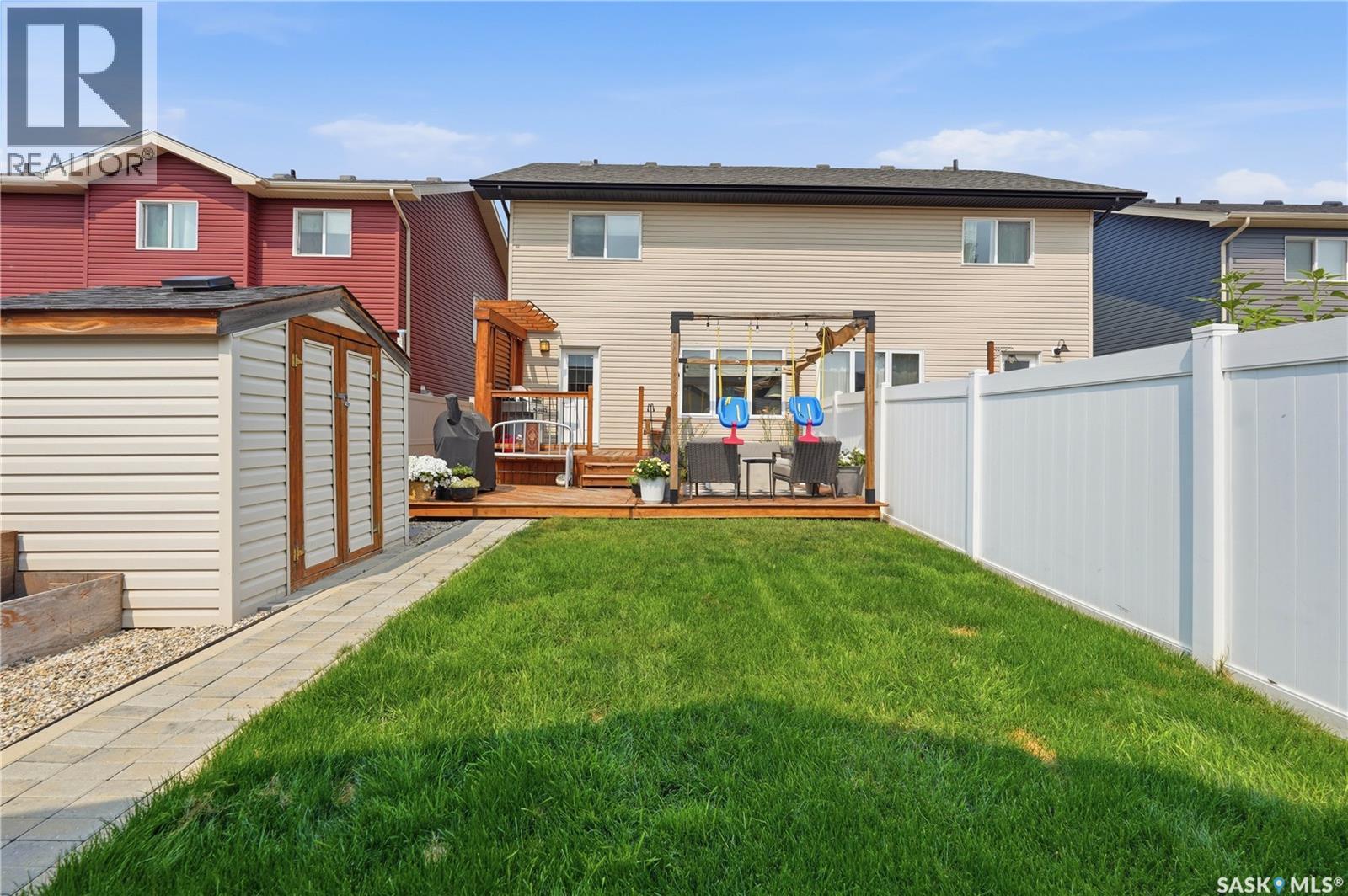 4409 Green Poplar Lane E, Regina, SK - Outdoor With Deck Patio Veranda With Exterior