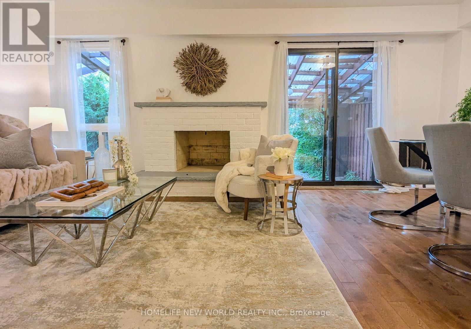 LIVING 5 - 60 James Park Square, Toronto, ON - Indoor With Fireplace