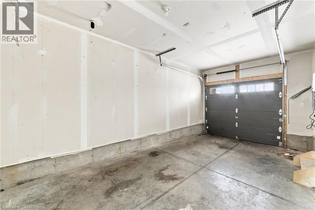 1169 Garner Road E Unit# 86, Hamilton, ON - Indoor Photo Showing Garage
