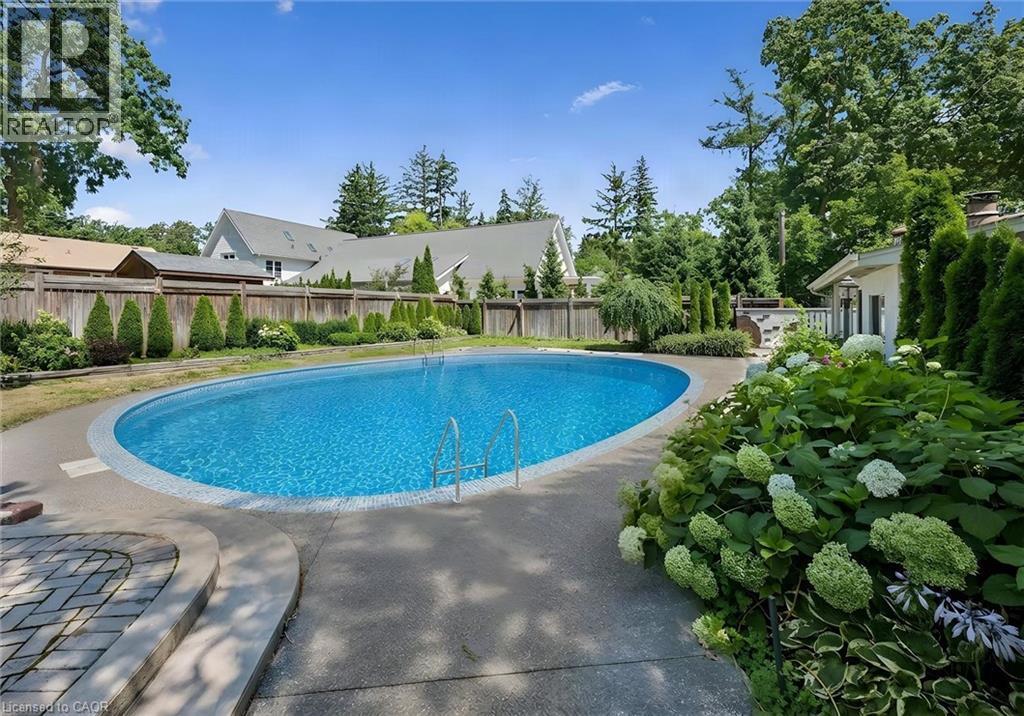 Virtually Staged/Rennovated - 138 Appleby Place, Burlington, ON - Outdoor With In Ground Pool With Backyard
