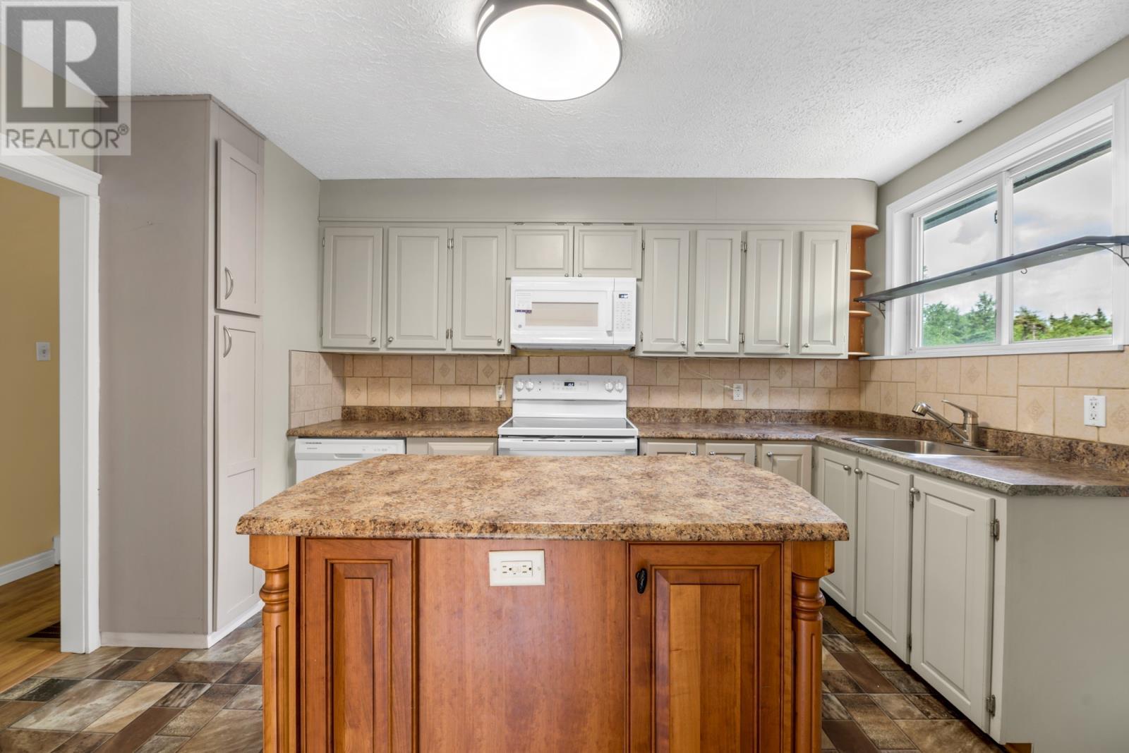 69 Conception Bay Highway, Holyrood, NL - Indoor Photo Showing Kitchen With Double Sink