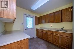 With doorway leading to the back yard - 