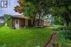 Back view of the home showing doors leading to the garage and the Mud Room - 