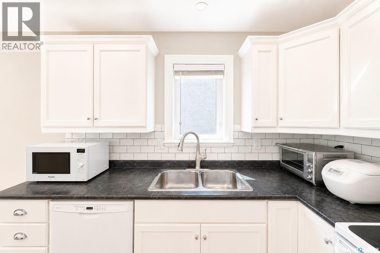 338 Stensrud Road, Saskatoon, SK - Indoor Photo Showing Kitchen With Double Sink