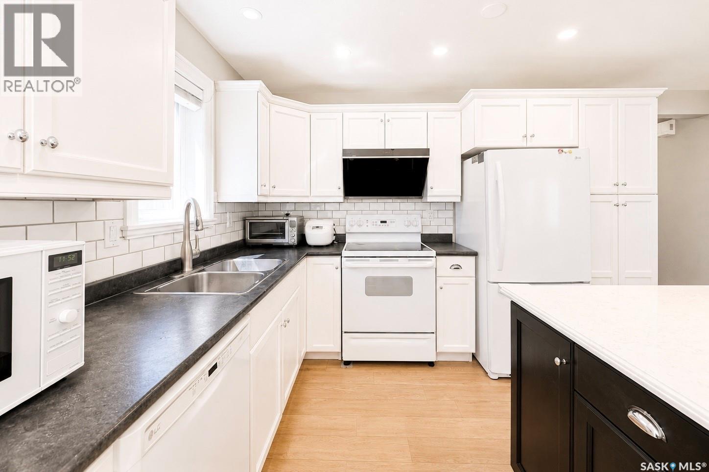 338 Stensrud Road, Saskatoon, SK - Indoor Photo Showing Kitchen With Double Sink