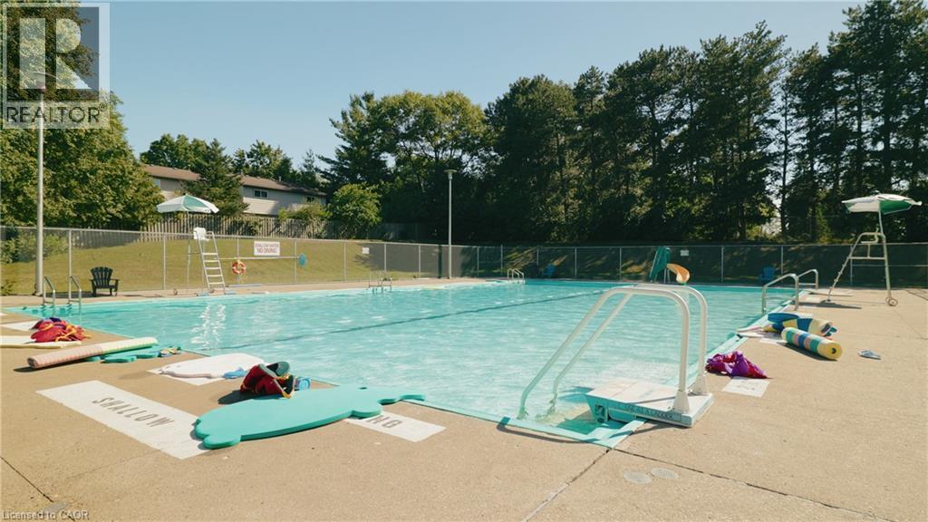 164 Jansen Avenue Unit# 11, Kitchener, ON - Outdoor With In Ground Pool With Backyard