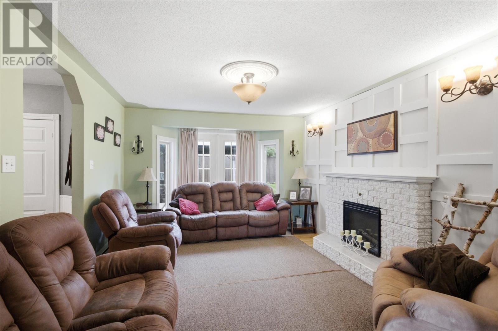 147 River Road, Appleton, NL - Indoor Photo Showing Living Room With Fireplace