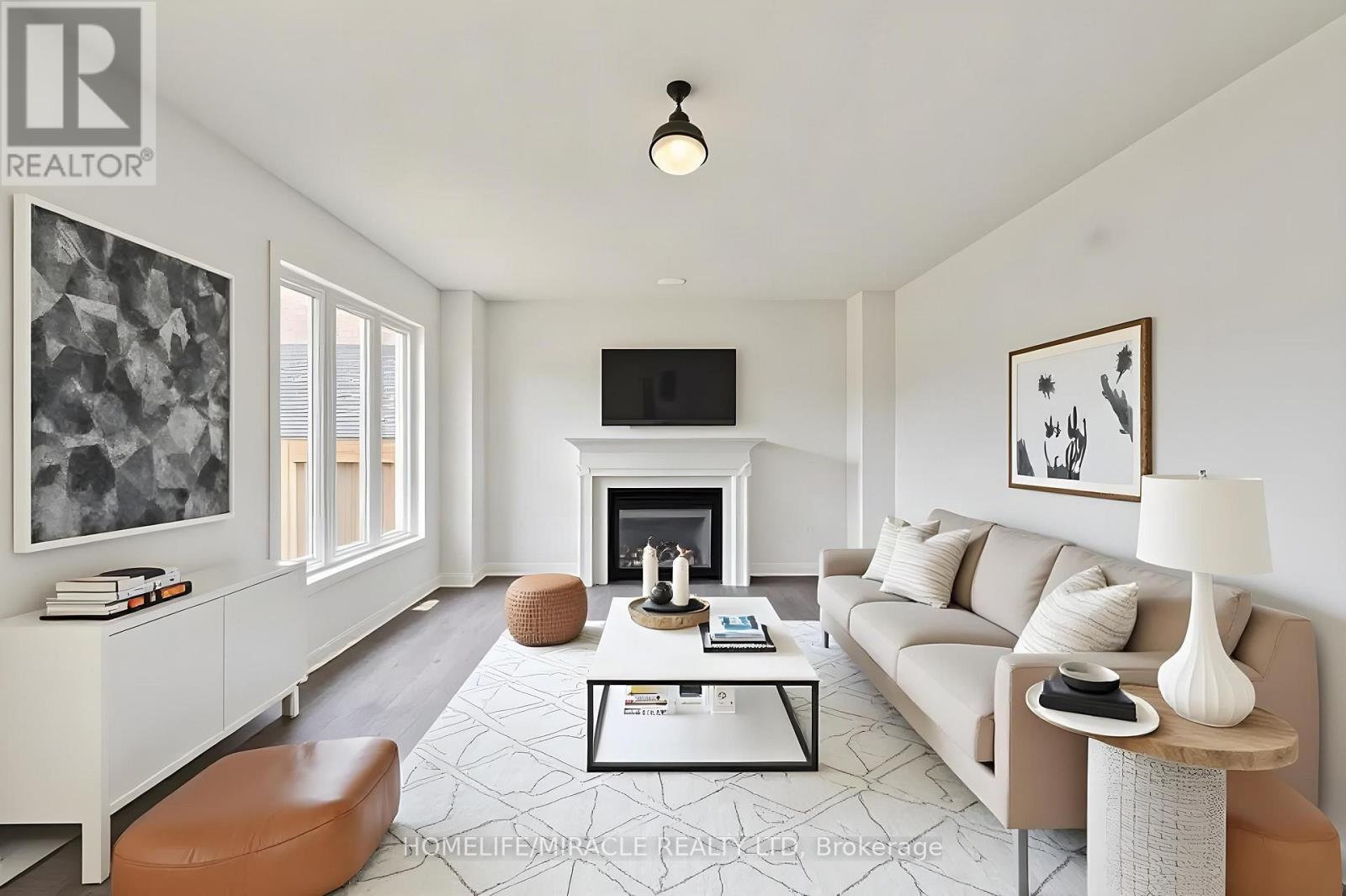 7 Empire Drive, Barrie, ON - Indoor Photo Showing Living Room With Fireplace
