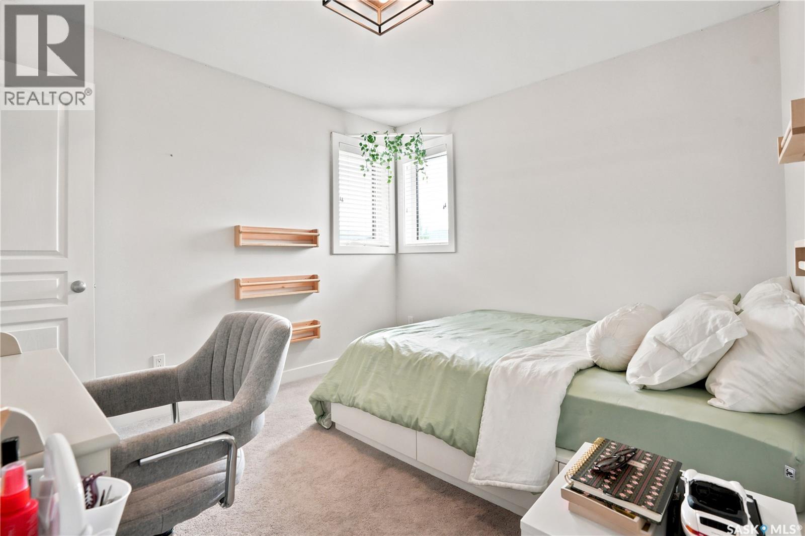 207 Kolynchuk Manor, Saskatoon, SK - Indoor Photo Showing Bedroom