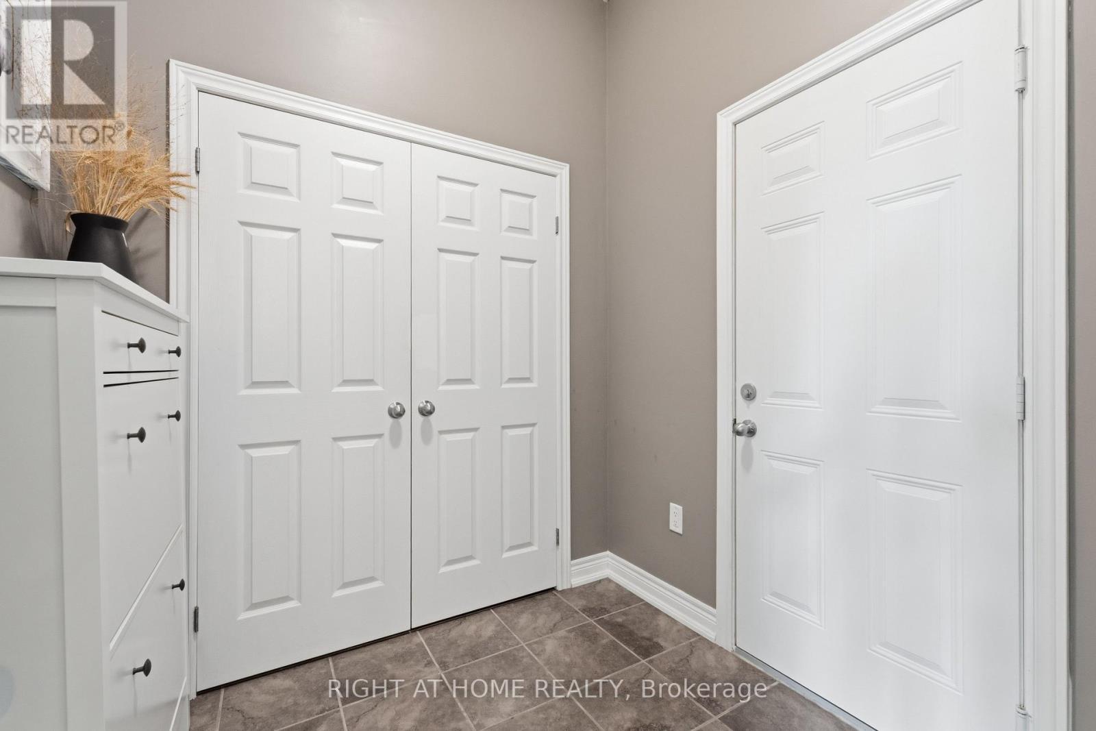 Mud room and garage access door - 38 Weaver Drive, Hamilton, ON - Indoor Photo Showing Other Room