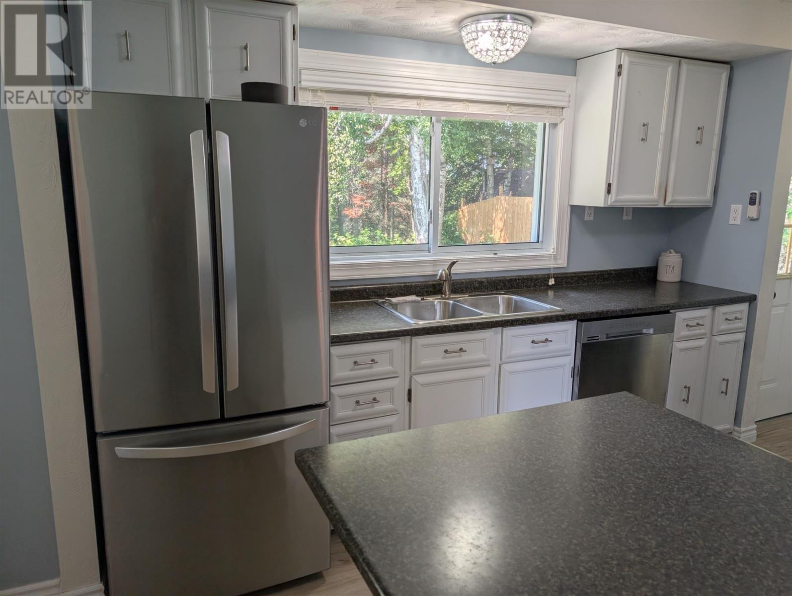112 Superior Ave, Wawa, ON - Indoor Photo Showing Kitchen With Double Sink