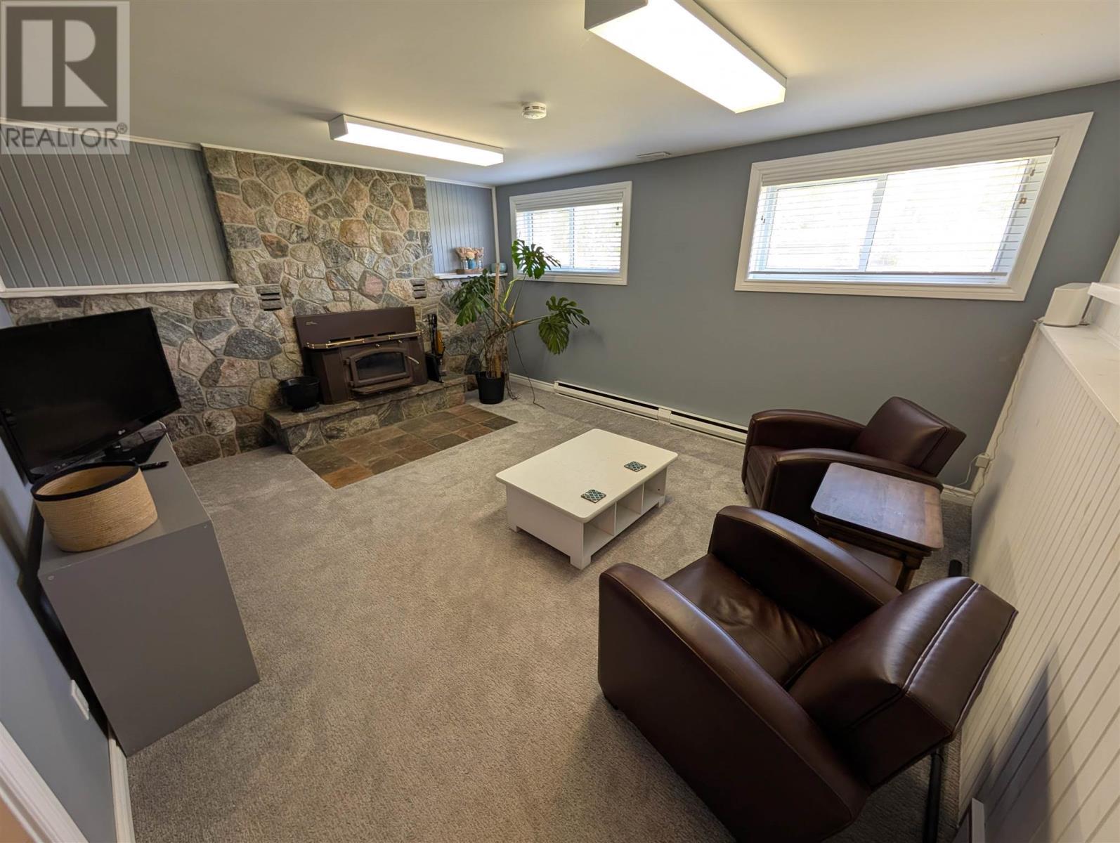 112 Superior Ave, Wawa, ON - Indoor With Fireplace