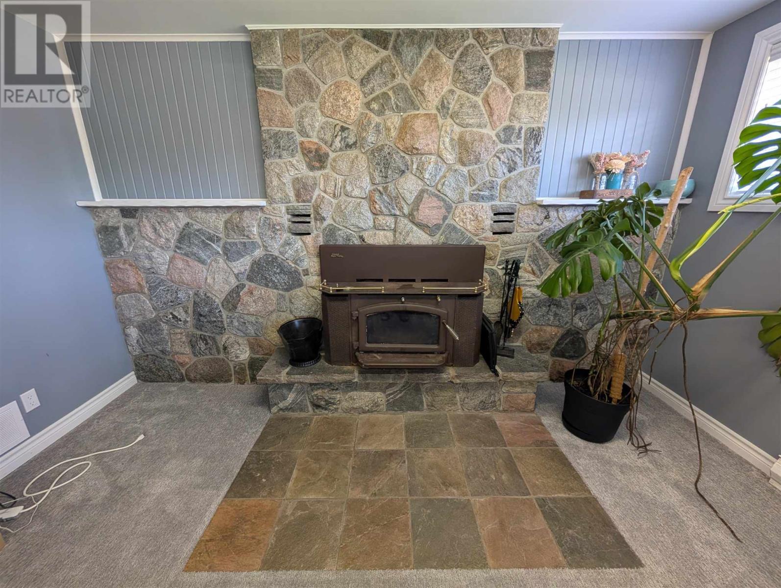 112 Superior Ave, Wawa, ON - Indoor Photo Showing Other Room With Fireplace