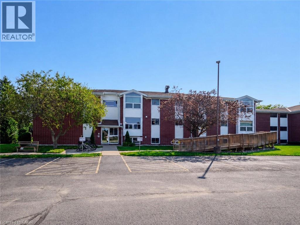 Welcome to Unit 206 - 60 Donly Drive Simcoe - back of building with ramp access to second floor level - 60 Donly Drive S Unit# 206, Simcoe, ON - Outdoor