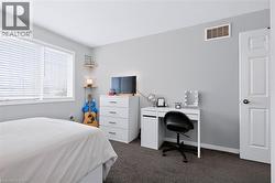 Soft gray wall color with white trim - 