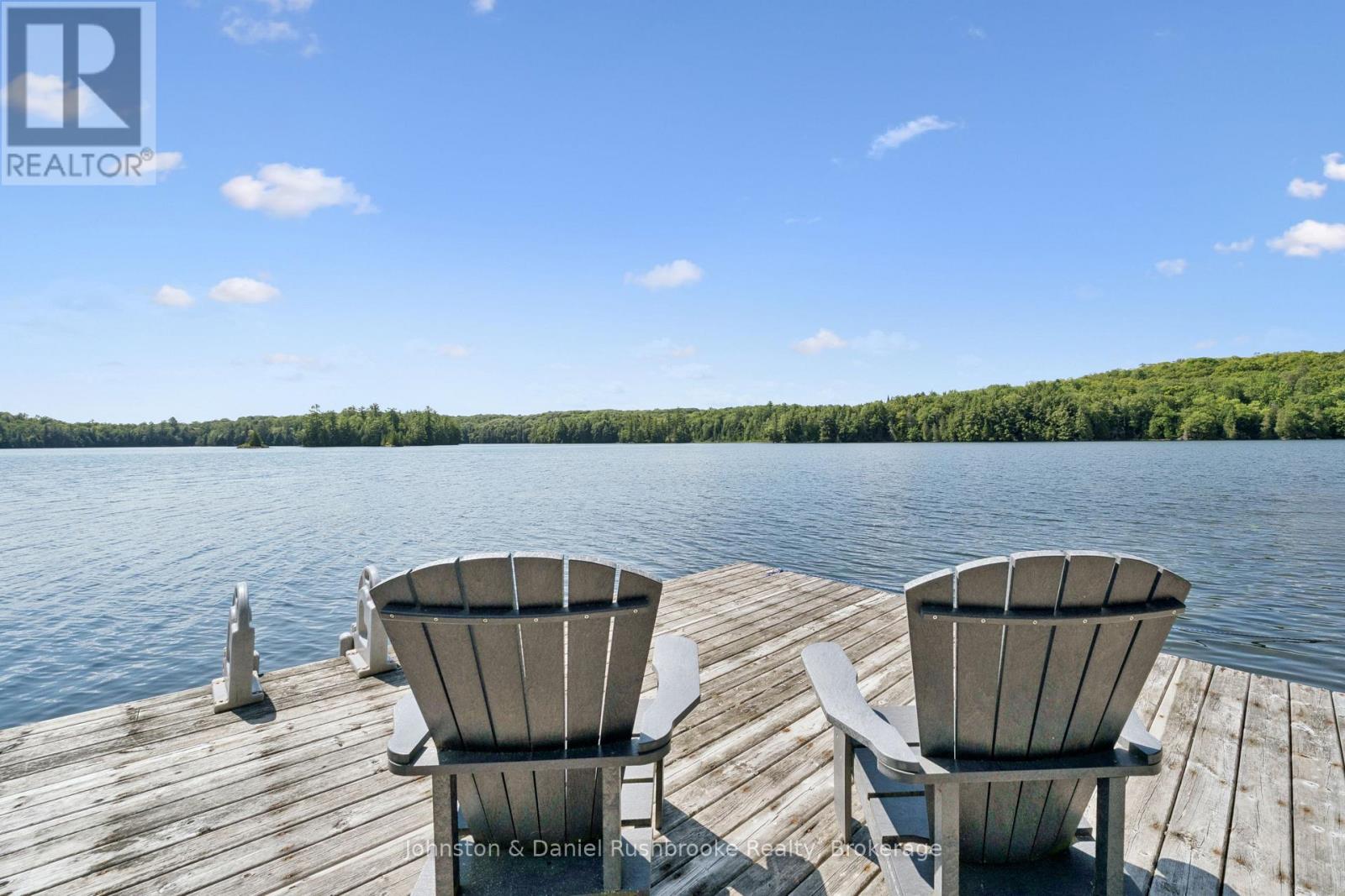 842 Emsdale Lake Road, Kearney, ON - Outdoor With Body Of Water With Deck Patio Veranda