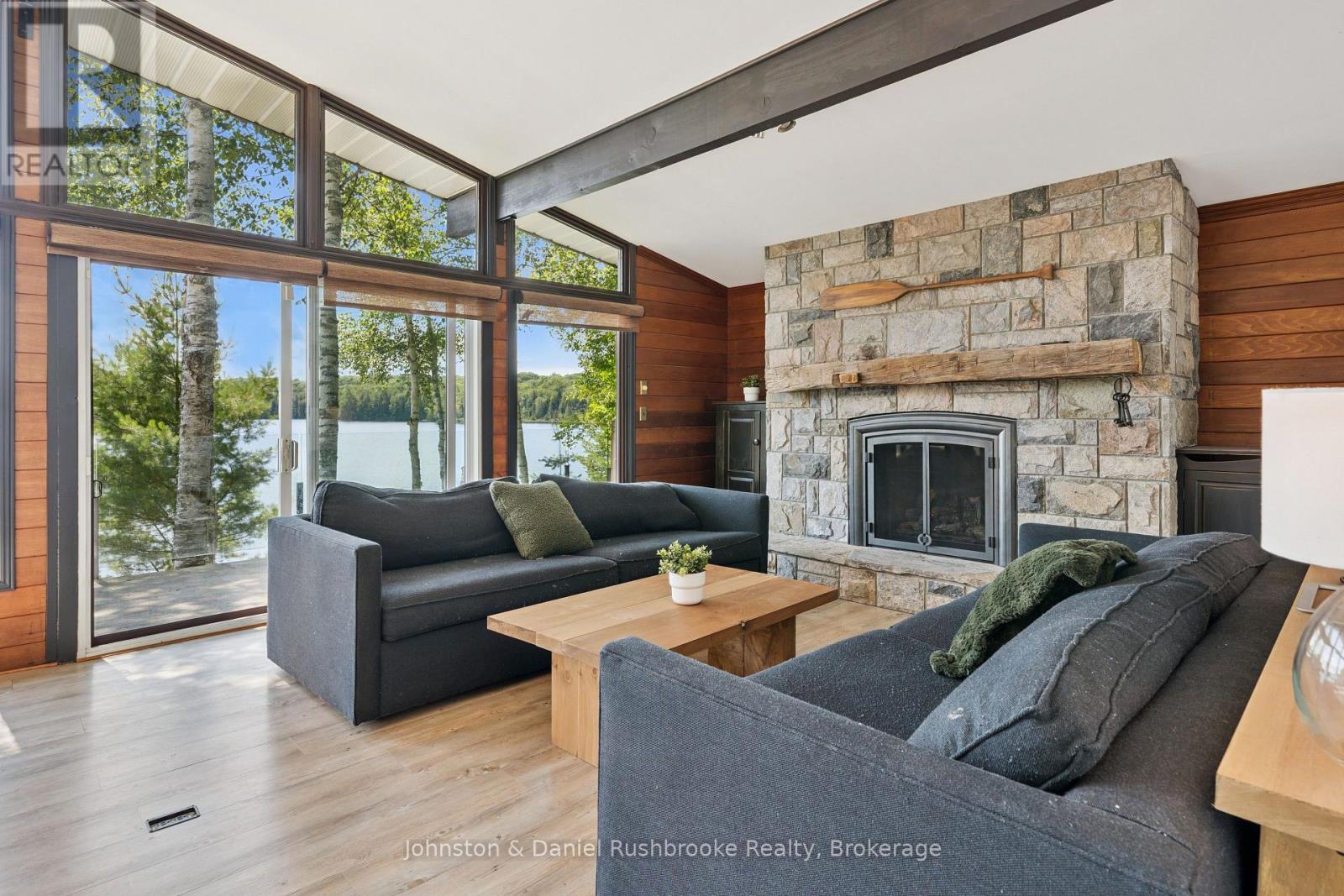 842 Emsdale Lake Road, Kearney, ON - Indoor Photo Showing Living Room With Fireplace