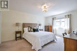 Main Floor Primary Bedroom - 