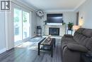 57 East 31St Street, Hamilton, ON  - Indoor Photo Showing Living Room With Fireplace 