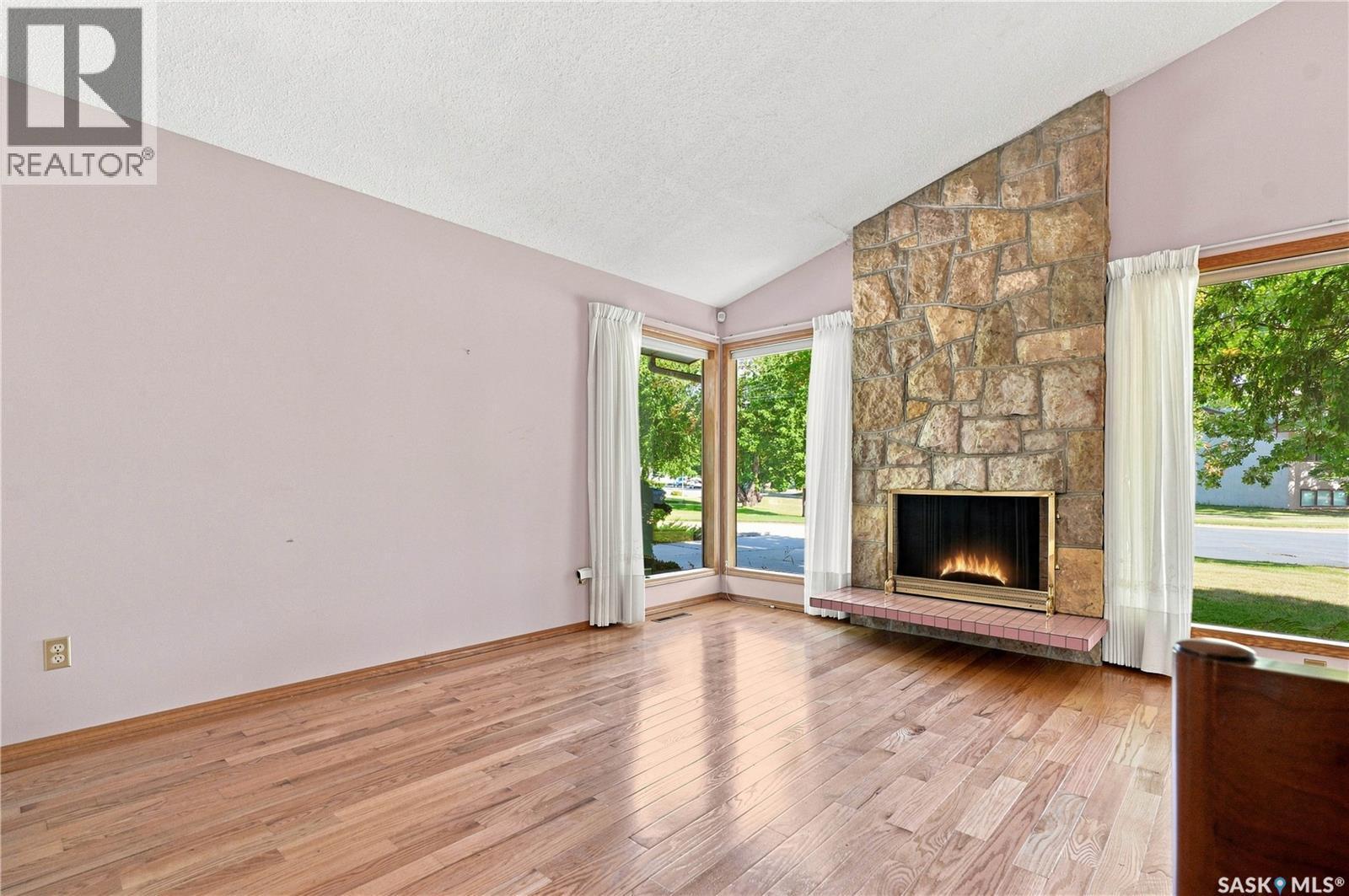 92 Wentworth Crescent, Saskatoon, SK - Indoor Photo Showing Living Room With Fireplace