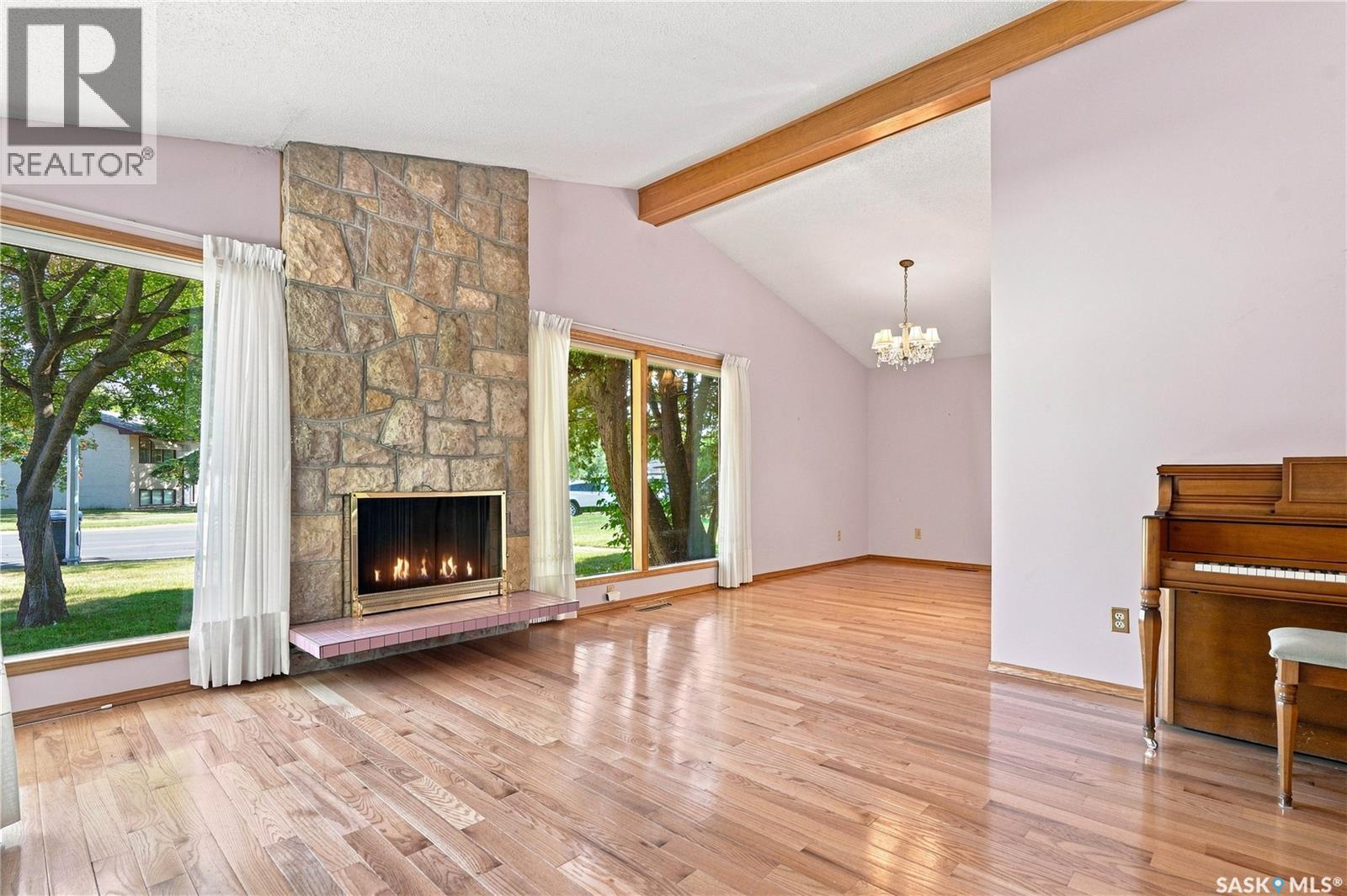 92 Wentworth Crescent, Saskatoon, SK - Indoor Photo Showing Living Room With Fireplace