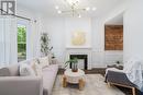 46 Murray Street E, Hamilton, ON  - Indoor Photo Showing Living Room With Fireplace 