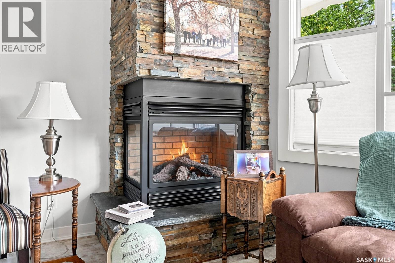 2 Springstein Avenue, Regina, SK - Indoor With Fireplace