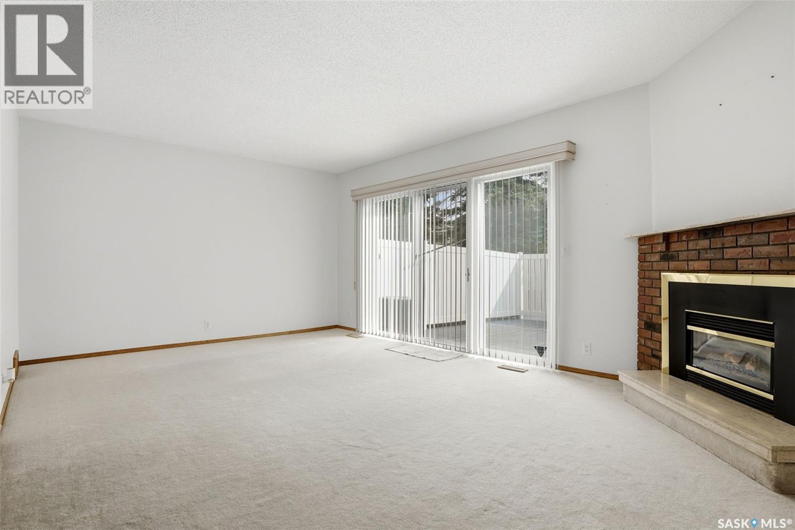 246 Plainsview Drive, Regina, SK - Indoor With Fireplace