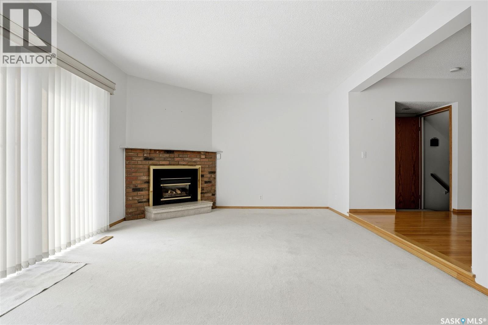 246 Plainsview Drive, Regina, SK - Indoor With Fireplace