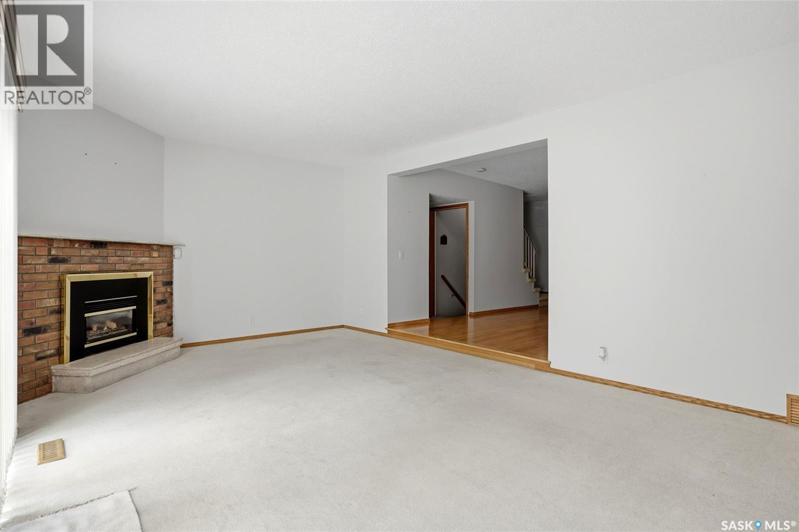 246 Plainsview Drive, Regina, SK - Indoor With Fireplace