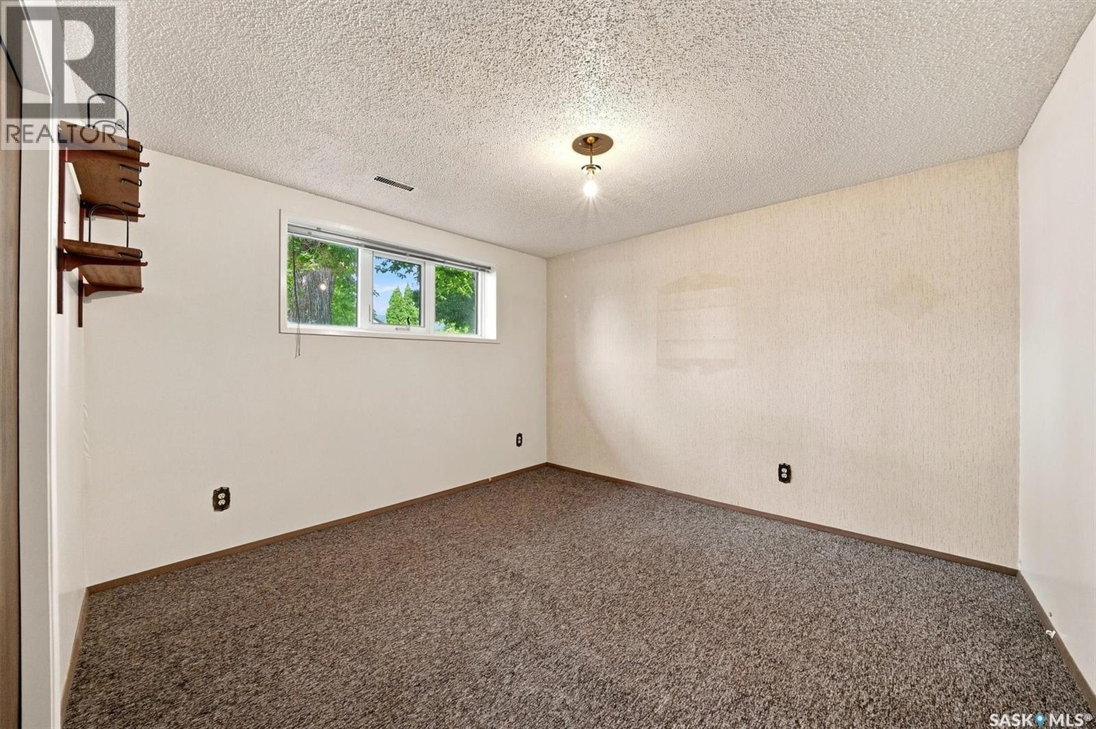 125 Arnason Crescent, Saskatoon, SK - Indoor Photo Showing Other Room